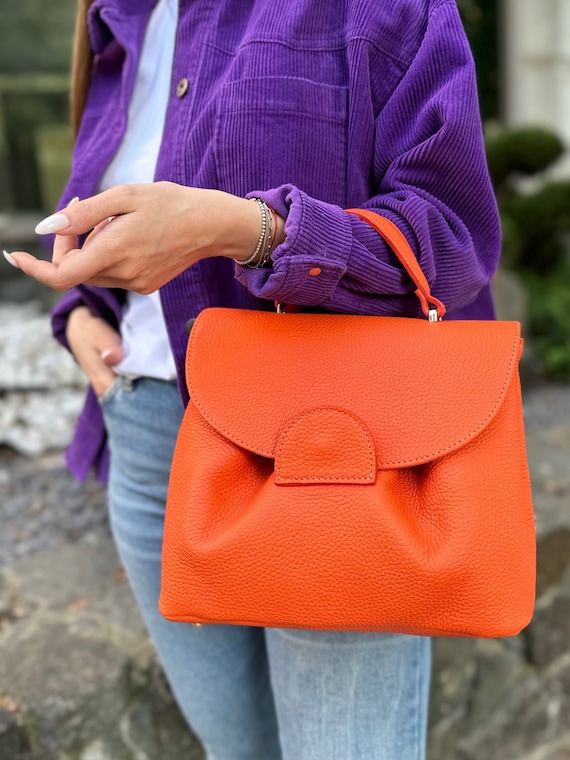 Bright orange handbag hot sale