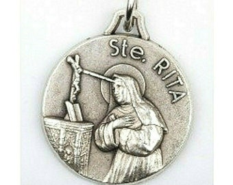 Sainte Rita médaille métal couleur argentée 18 mm