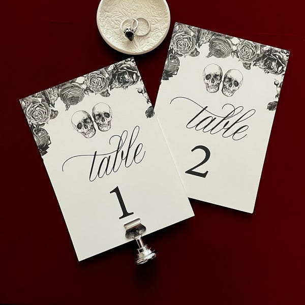 Skull wedding table numbers for a gothic wedding reception