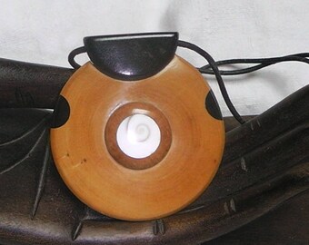 Necklace has been turned, carved out of boxwood, ebony, Heather with inlay &quot;eye of Shiva&quot;, &quot;Trio of wood&quot;