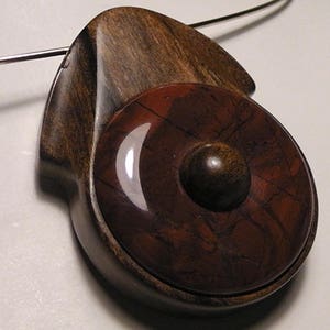 Contemporary necklace carved sandalwood with inlay of Red Jasper