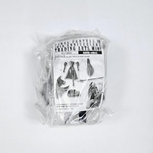 May include: A sealed plastic package containing a Final Fantasy VII 10th Anniversary Trading Arts Mini figure of Sephiroth. The package includes a diagram of the figure and its components. The figure is for ages 15 and up.