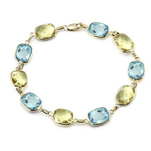 14K Yellow Gold Gemstone Bracelet With Cushion Cut Blue Topaz And Lemon Topaz Link Stations
