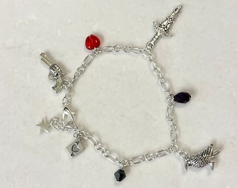 Six of crows inspired charm bracelet with four charms and three beads handmade