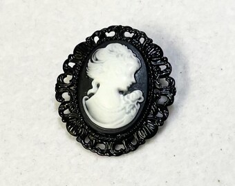 Cameo lady brooch in a black setting Handmade