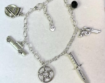 Supernatural inspired charm bracelet with seven tibetan silver and glass charms Handmade