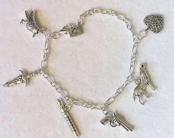 Six of crows inspired charm bracelet with a charm for each character handmade