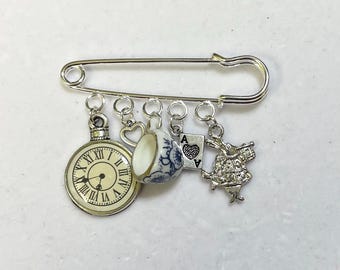 Alice in Wonderland inspired brooch with tiny ceramic teacup watch and rabbit charms Handmade