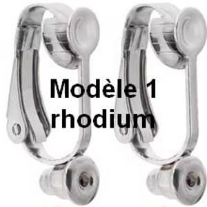 May include: A pair of silver-toned metal clip-on earring converters with a hinged mechanism and a circular base. The text "Mod&egrave;le 1 rhodium" is printed in black across the centre of the image, overlaying the two identical earring components.