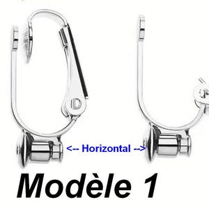 May include: A set of three silver-toned metal clip-on earring converters with a horizontal orientation. The components feature a hinged clip mechanism and a small circular post base. The text "<-- Horizontal -->" and "Mod&egrave;le 1" is visible.