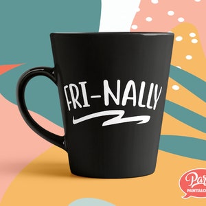 May include: Black coffee mug with white text that reads "FRI-NALLY". The mug is on a colorful background with abstract shapes.