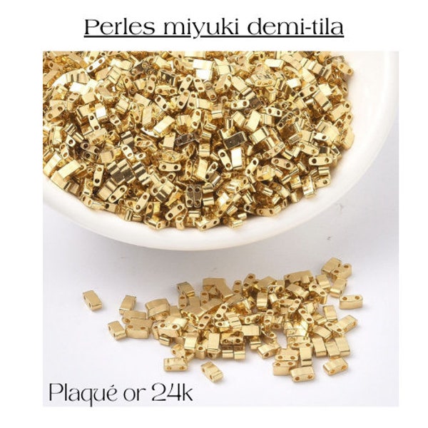 Perles de rocaille Miyuki demi-tilla, 2 trous,  plaqué or 24 k, vendu au gramme,  5x2.3x1.9mm, Trou: 0.8mm, perles de verre japonaises