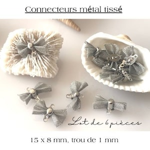 May include: Silver woven metal bow connectors. The image shows six bow connectors, some inside a seashell and others on a white surface. The text reads "Connecteurs métal tissé" and "Lot de 6 pièces". Each bow measures approximately 0.6 x 0.3 inches with a 0.04 inch hole.