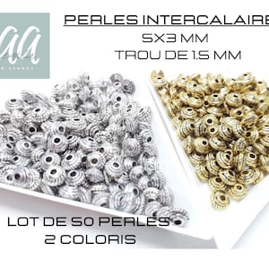 May include: A lot of 50 silver and gold spacer beads, each bead is 3 mm in diameter with a 1.5 mm hole. The beads have a textured, ridged design.