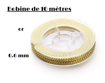 10 mètres de fil or antique, métal  et nylon, 0,6 mm de diamètre, idéal pour tous vos petits travaux d'embellissement, bobine