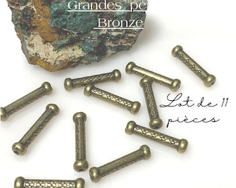 Lot unique, lot de 11 longes perles en forme d'altères, laiton couleur bronze, 21 x 5 mm, Trou: 1 mm