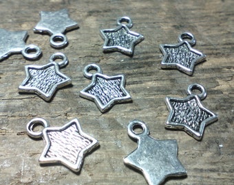 Lot of 10 "star" pendants/charms/antique silver/ 12 x10 mm