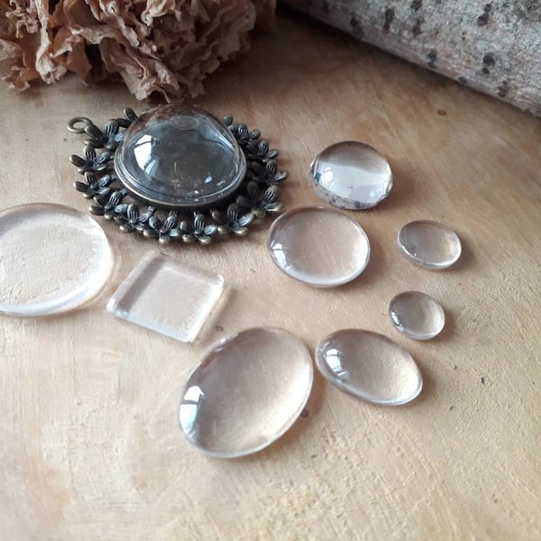 Lot de 10 cabochons 18 x 13  mm ,plats,  ovales, transparents, verre , supports cabochons, création bijoux fantaisie