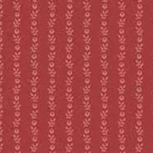 May include: Red fabric with a repeating pattern of vertical lines. Each line features small, white, floral-like designs. The background is a solid, muted red colour, creating a simple yet visually interesting textile.