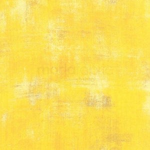 Puede incluir: Un fondo amarillo texturizado con un aspecto desgastado sutil. El fondo tiene una apariencia descolorida y vintage.