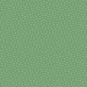 May include: Green fabric featuring a repeating pattern of tiny, off-white leaf motifs. The leaves are evenly distributed, giving a textured look. The fabric has a soft, matte finish.
