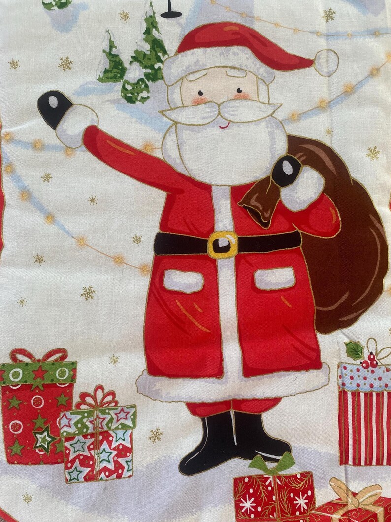 May include: A festive fabric featuring a cartoon Santa Claus in a red suit with a black belt and boots, carrying a sack. The background includes snow, Christmas trees, and wrapped gifts in red and green.