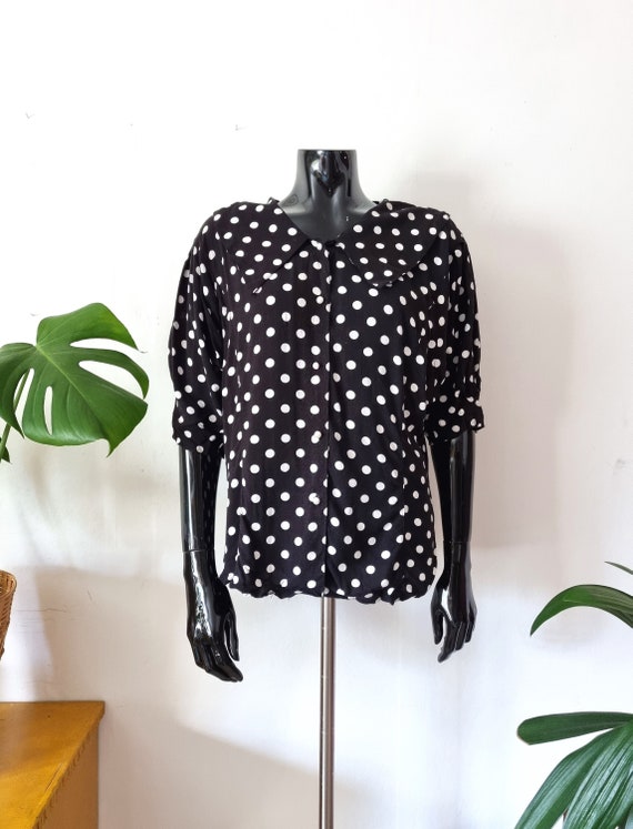 large polka dot blouse