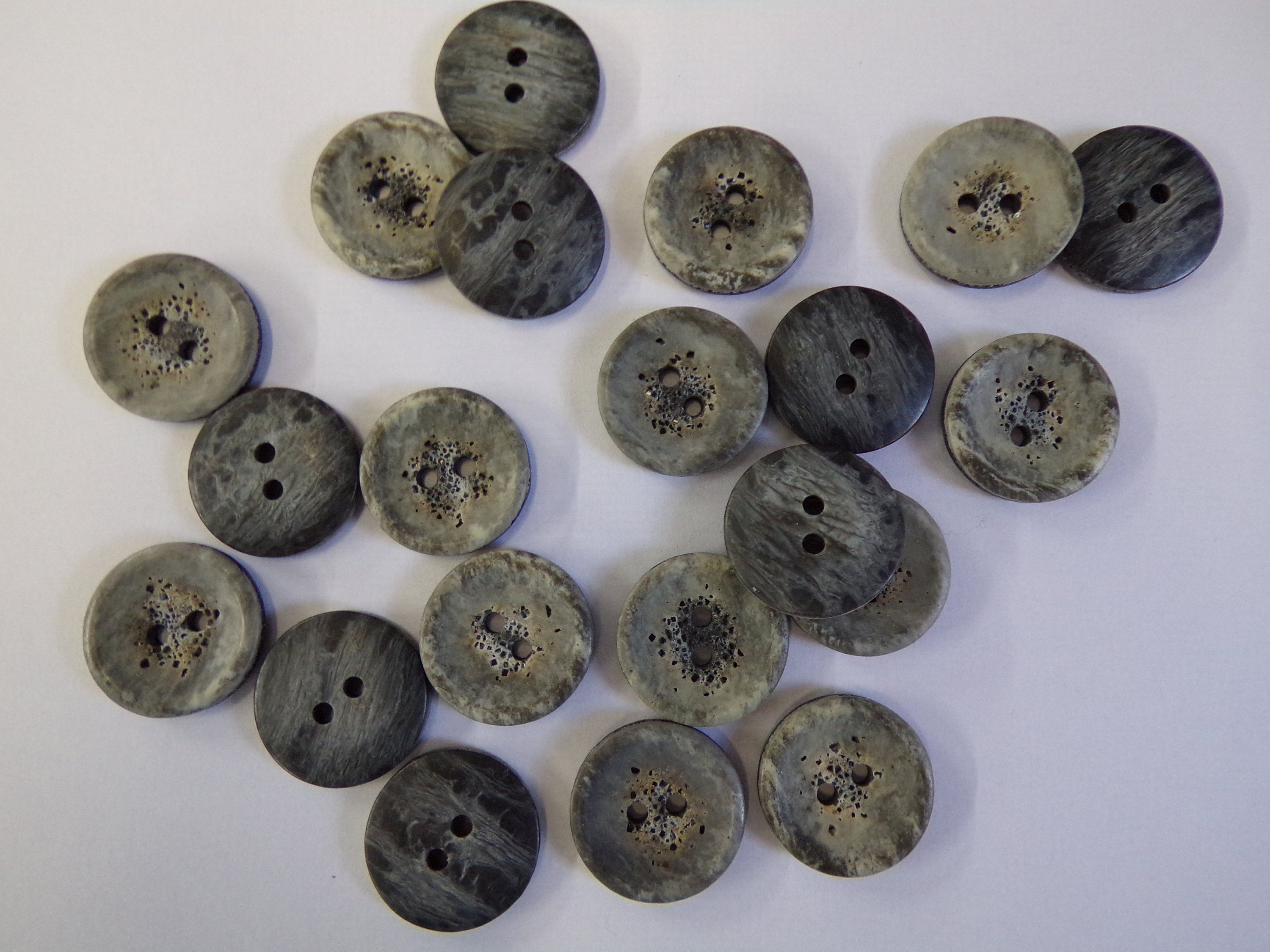 Large gray clearance buttons