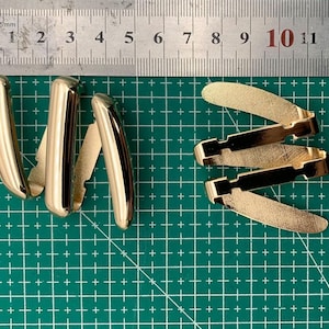 modieuze bies, gesp, gouden gesp, badkledinggesp, modieuze gesp, nieuwe gesp, designergesp, passementen