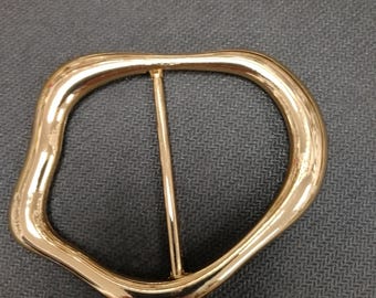 metalen gesp, golvende gouden gesp, staafgesp