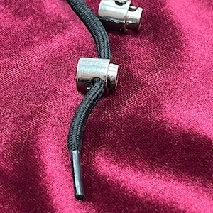 Metal Heavyweight Spring loaded toggle, toggle, black toggle, stopper cord, cord ends, Metal toggle cords, Metal Toggles, Hoody Cord ends