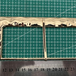 metal gold buckle, gold buckle, shiny gold buckle