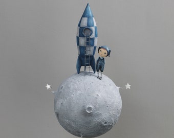 Mobile Little character and his rocket on the planet