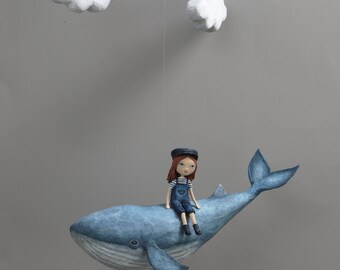 Mobile Little girl on her whale in the clouds