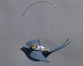 Mobile Bambina addormentata sull'uccello notturno