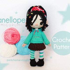 May include: Crochet pattern for a Vanellope amigurumi doll. The doll is wearing a green sweater, brown skirt, and striped leggings. The doll has black hair with a red headband and colorful sprinkles.