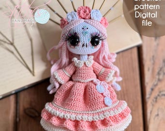 May include: A handmade crochet doll with a light blue face, large black eyes, and long pink hair. The doll wears a pink dress with white trim and a floral headpiece. The image includes the text "Crochet pattern Digital file".