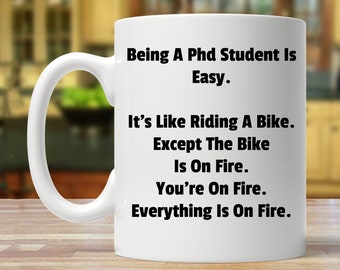 Funny PhD Graduation Mug: On Fire Student Gift