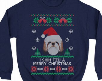 May include: Navy blue Christmas sweater with a white Shih Tzu dog wearing a Santa hat. The sweater has a red, green, and white snowflake pattern with the text "I Shih Tzu a Merry Christmas".