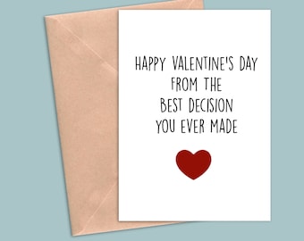 May include: White card with black text that reads "Happy Valentine's Day from the best decision you ever made". A red heart is below the text.