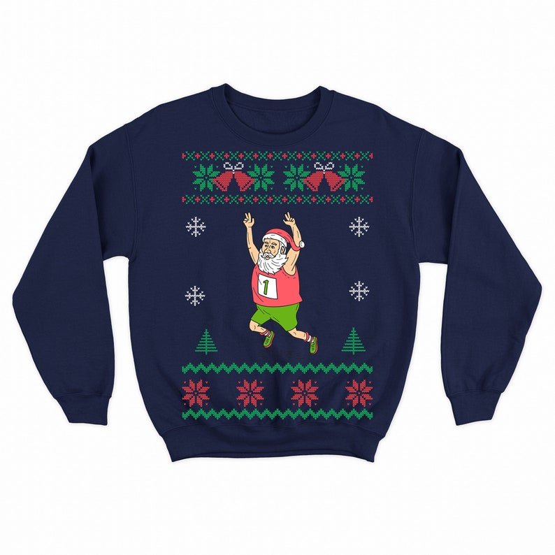 May include: Navy blue Christmas sweater with a white, red, and green pattern. The sweater features a cartoon image of Santa Claus running with the number "1" on his shirt.