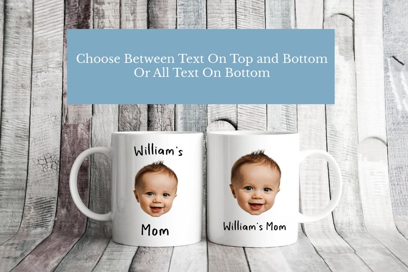 May include: Two white ceramic mugs with a baby's face printed on them. The mug on the left has the text "William's Mom" printed on it. The mug on the right has the text "William's Mom" printed on it.