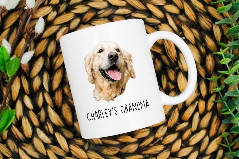 May include: White ceramic mug with a golden retriever dog illustration and the text "CHARLEY'S GRANDMA" printed on the front.