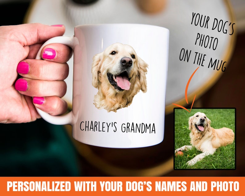 May include: White ceramic mug with a photo of a golden retriever dog on it. The mug says "CHARLEY'S GRANDMA" on the bottom. The text "YOUR DOG'S PHOTO ON THE MUG" is on the right side of the image. The text "PERSONALIZED WITH YOUR DOG'S NAMES AND PHOTO" is at the bottom of the image.