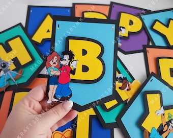 May include: A vibrant banner spelling "HAPPY BIRTHDAY" with individual letter flags. Each flag is a different colour, with yellow letters and black borders. The banner features cartoon characters, including Goofy and Max.