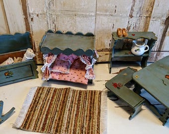 Antique farmer&#39;s room.Doll&#39;s house.Cradle, canopy bed, table, chest, shelf.Old baby doll.Antique fabrics. Vintage.To love