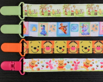 Pacifier Clip: Disney Winnie the Pooh - Pooh Bear Eeyore Tigger Piglet | boy & girl ribbon paci holder, baby shower gift, binky soothie mam