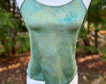 May include: A green and blue tie-dye tank top with a scoop neck and thin straps. The tank top is made of a soft, lightweight fabric.