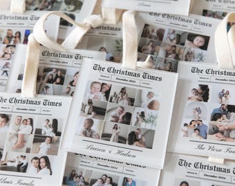May include: A set of 10 Christmas ornaments featuring a newspaper design with family photos and the text "The Christmas Times". Each ornament has a white background with black text and a white ribbon for hanging.