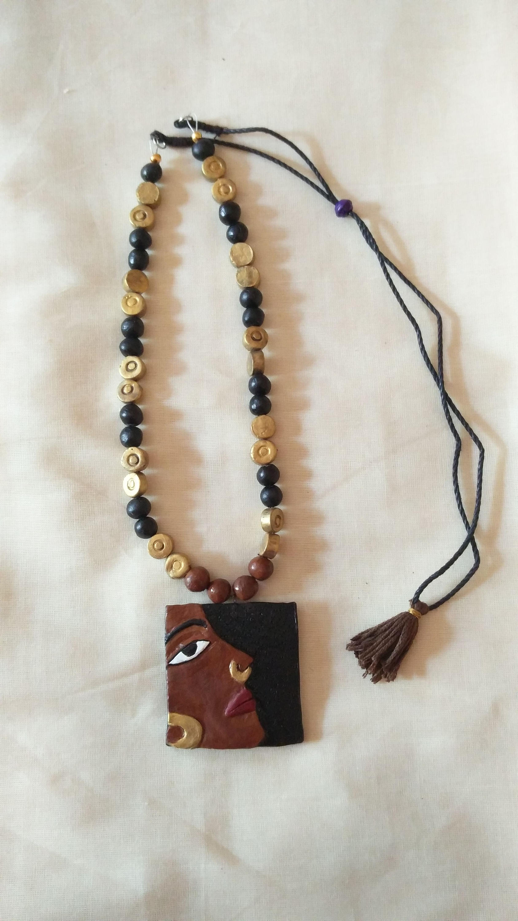 Black and Brown Necklace With Carved Women Face-indian - Etsy